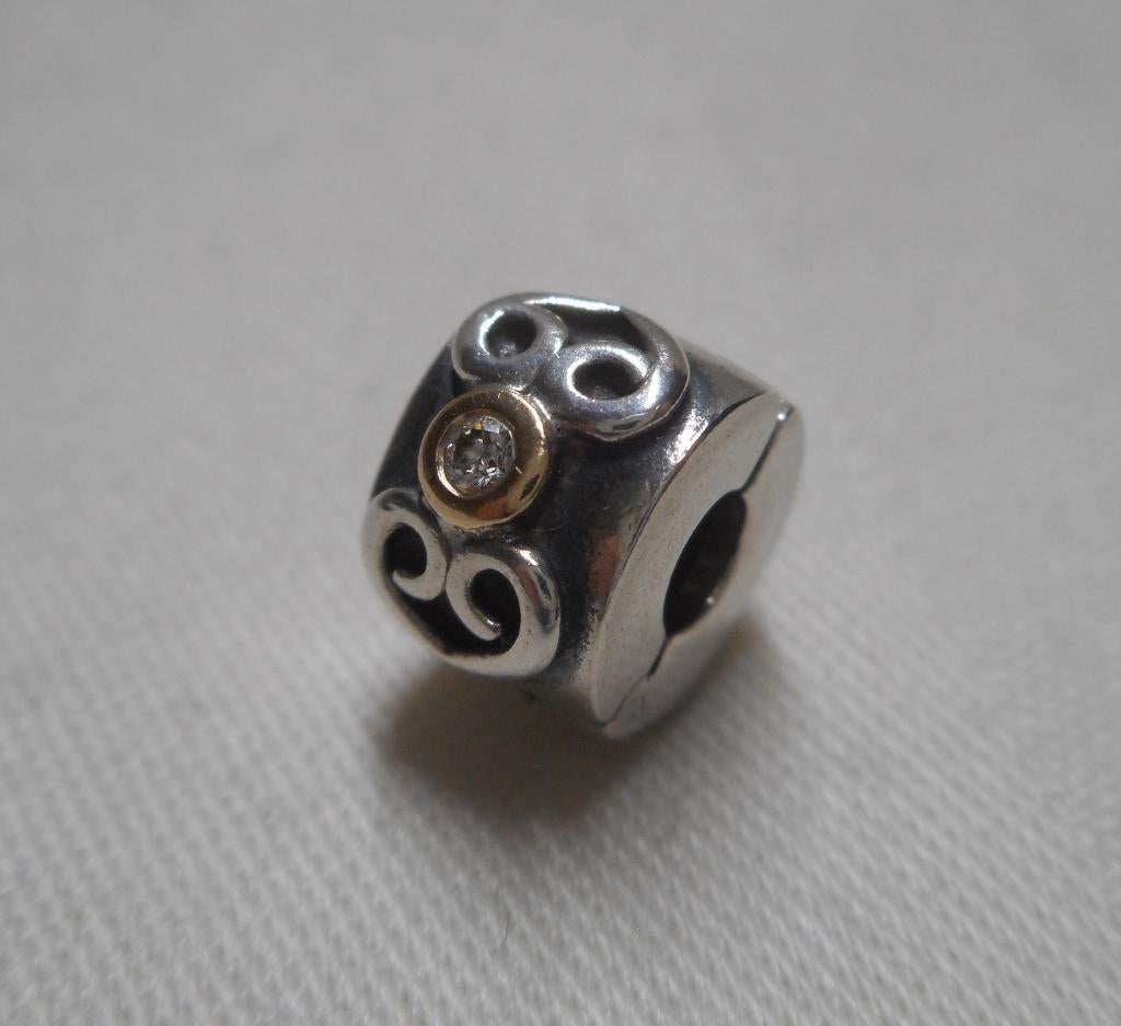 Zilveren Pandora Clip bedel met 14 kt goud en diamant nr.659