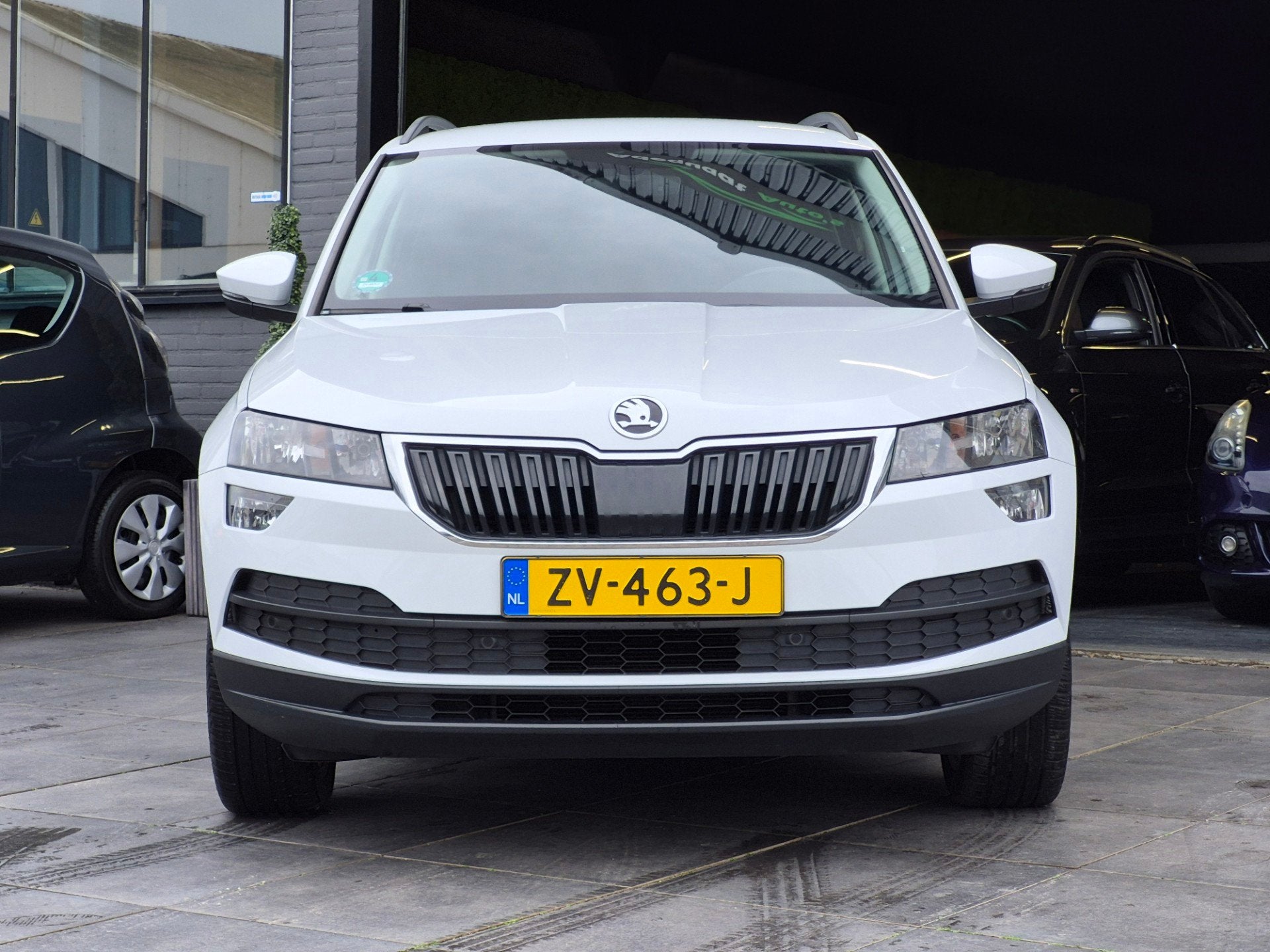Skoda Karoq 1.0TSI Ambition Business|DSG|Cruise|Trekhaak|NAP, Auto's, Dealer onderhouden, Stof, Gebruikt, Met garantie (alle)