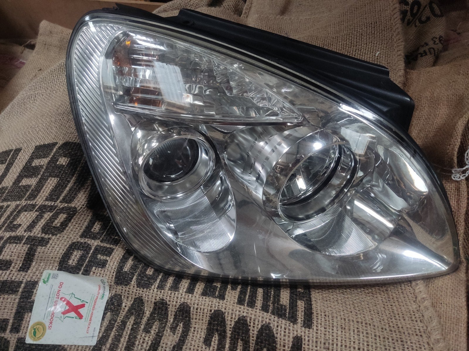 Koplamp rechts Kia Carens 2008, Ophalen of Verzenden, Gebruikt, Nissan