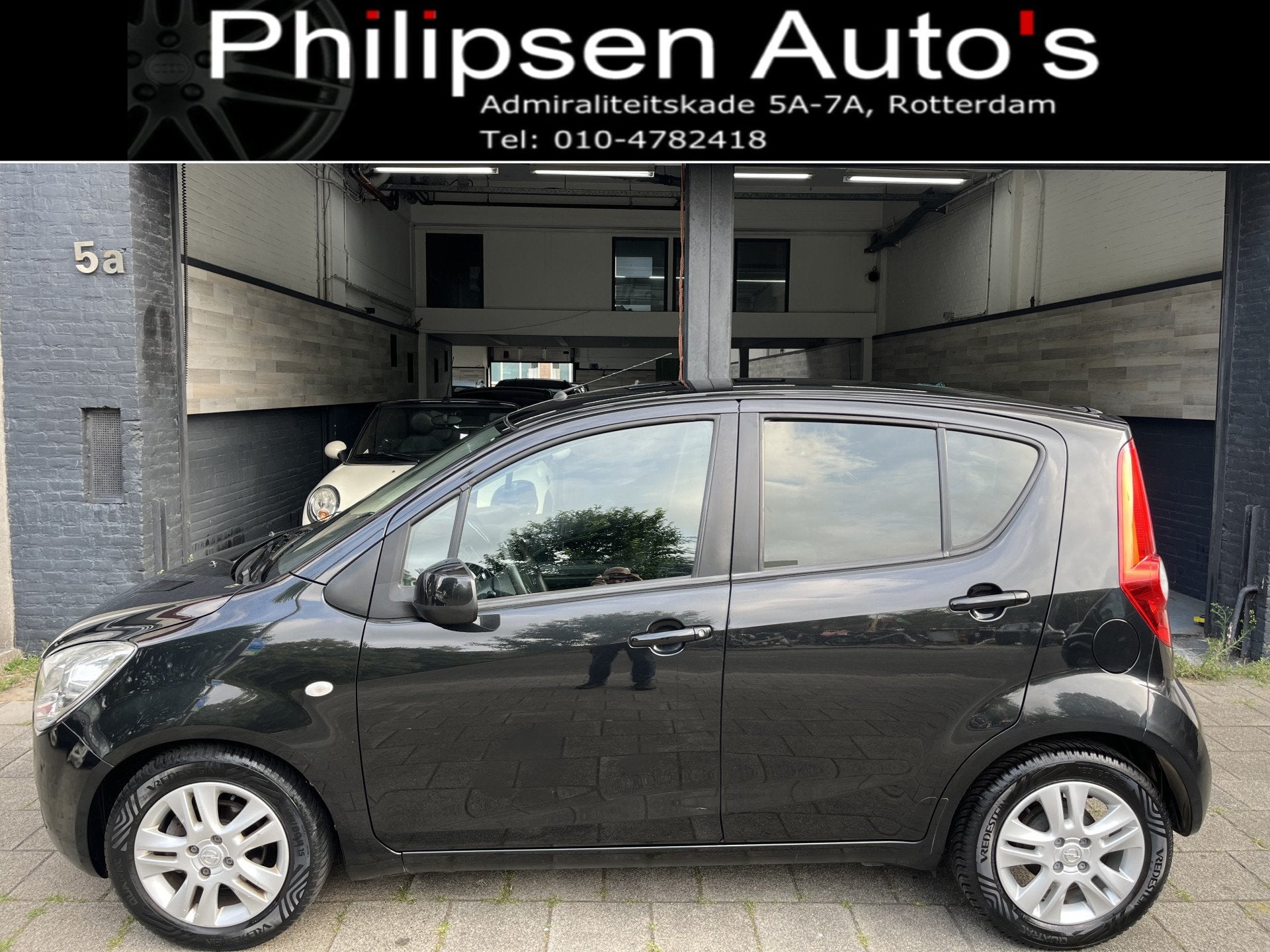 Opel Agila 1.2 Edition Automaat Airco (bj 2012), Auto's, Opel, Stof, 4 cilinders, Met garantie (alle), Zwart