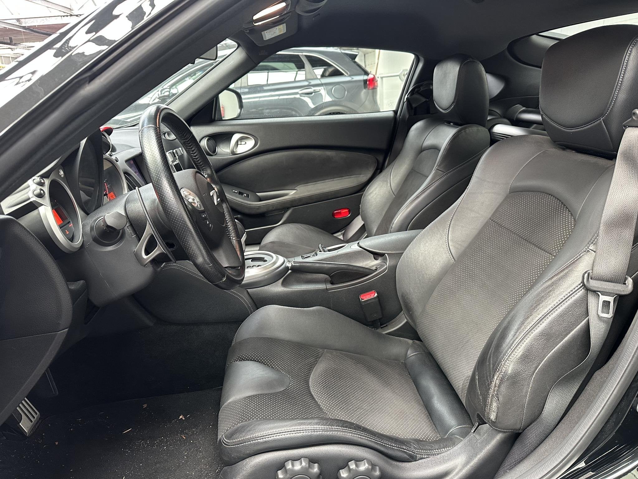 Nissan 370Z 3.7 V6 Pack Nette staat! keurige auto en Full Op, Auto's, Achterwielaandrijving, Gebruikt, Leder en Stof, Zwart