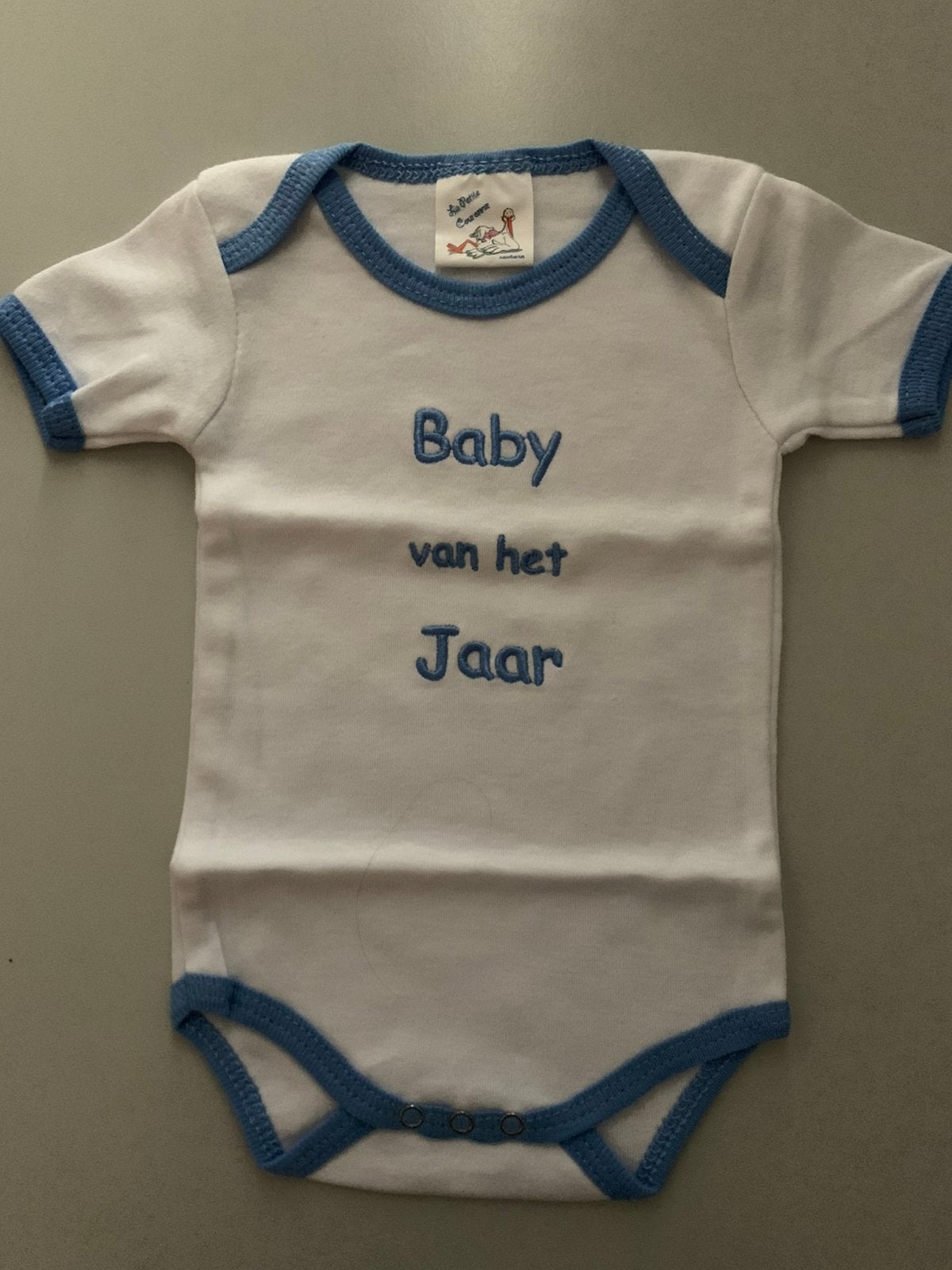 Nieuw (zonder kaartje) - Romper maat 50 ‘Baby van het jaar’, Ophalen of Verzenden, Nieuw, Jongetje of Meisje, Nacht- of Onderkleding