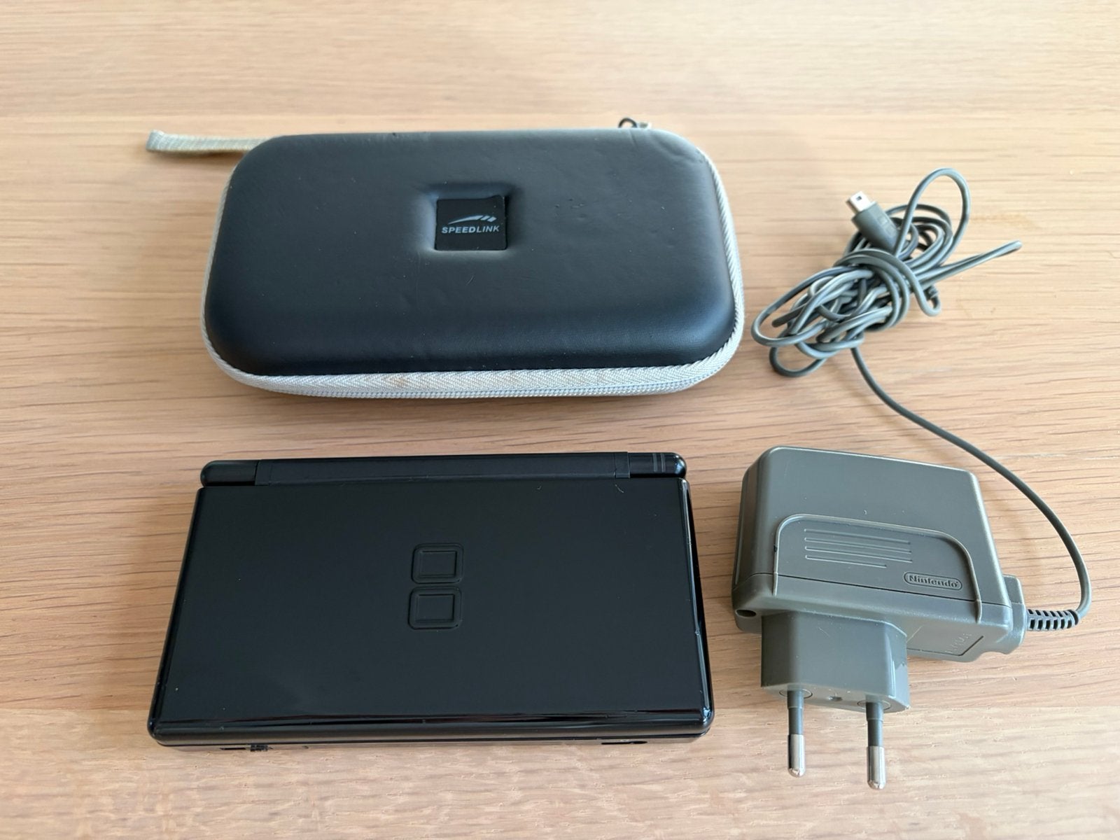 Nintendo DS Lite zwart – compleet met accessoires & spel, Spelcomputers en Games, Met games, Gebruikt, Zwart, Ophalen of Verzenden