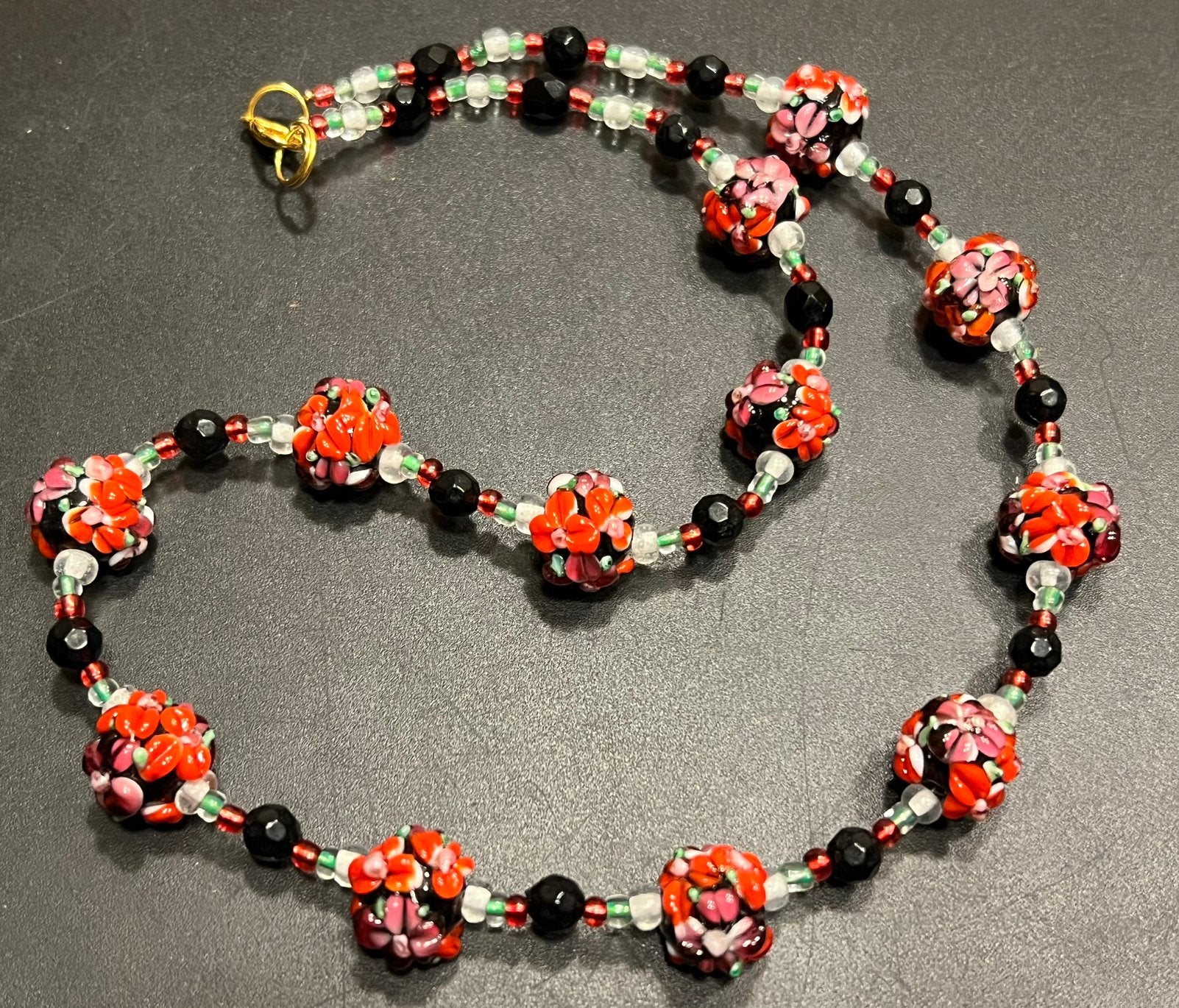 Mooie Murano millefiori rood zwarte lampwork kralenketting, Sieraden, Tassen en Uiterlijk, Kettingen, Ophalen of Verzenden, Zo goed als nieuw