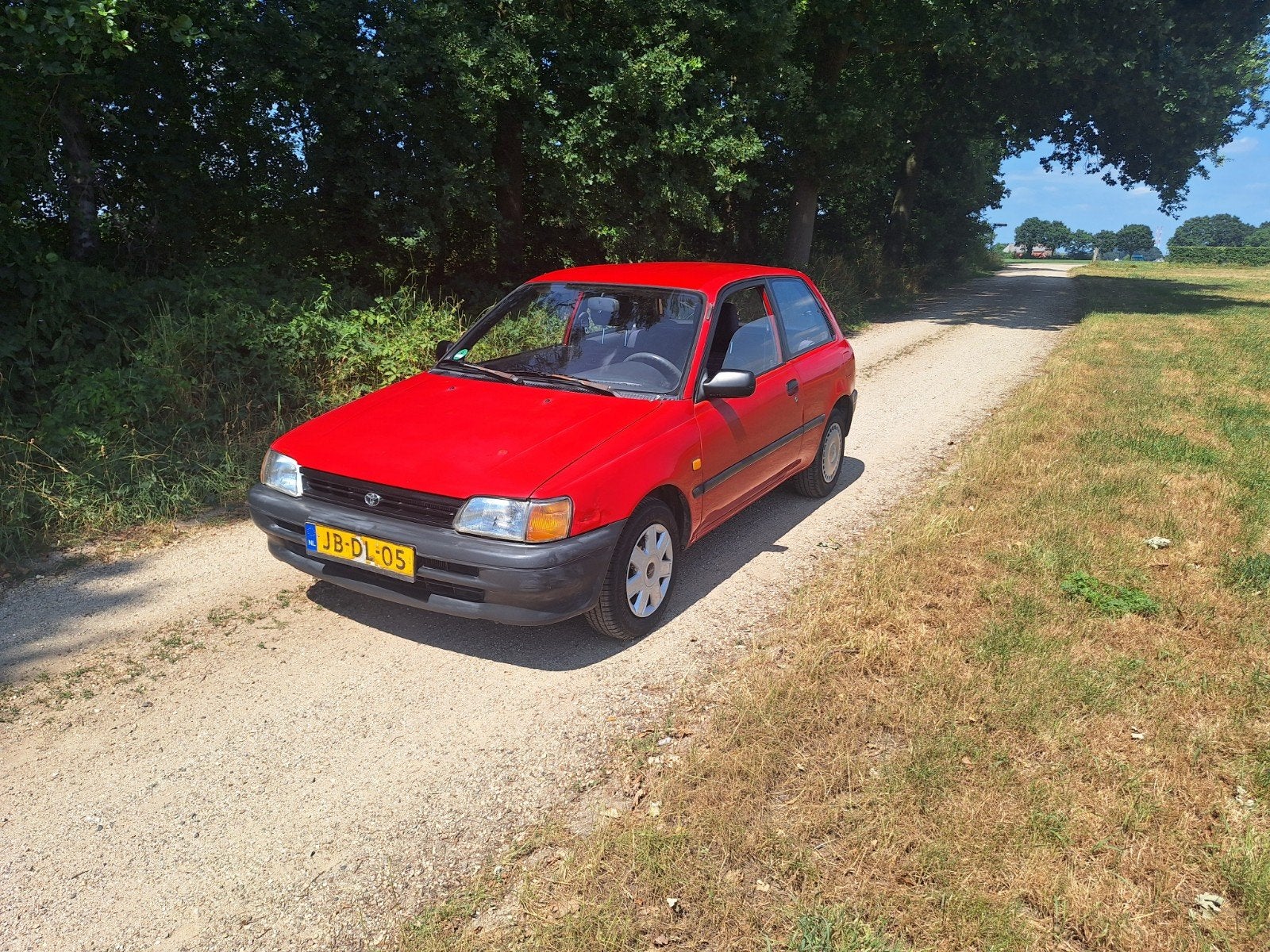 Toyota Starlet 1.3 XLI AUT E2 1994 Rood, 74 pk, 4 cilinders, Starlet, 400 kg