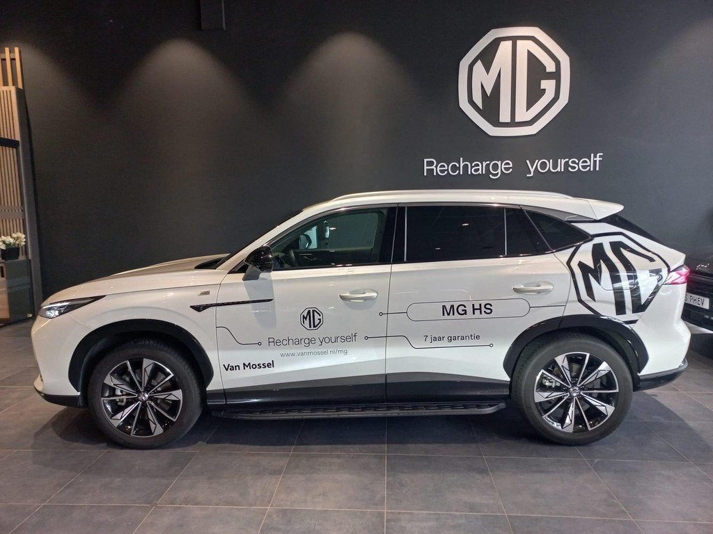 MG HS PHEV 1.5 272pk Aut. Luxury | 100km Electrisch | Navi |, Auto's, MG, 12 maanden, Stof, Automatische klimaatregeling, 4 cilinders