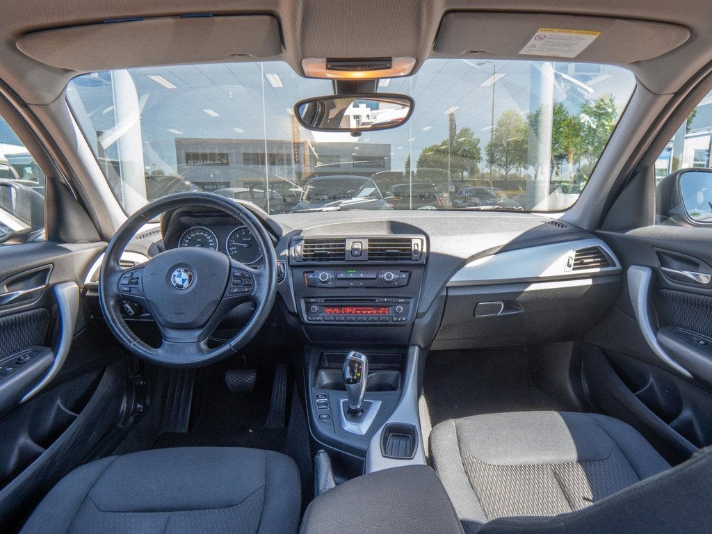 BMW 1 Serie 116i High Executive | Automaat | Cruise Control, 136 pk, Gebruikt, 4 cilinders, Leder