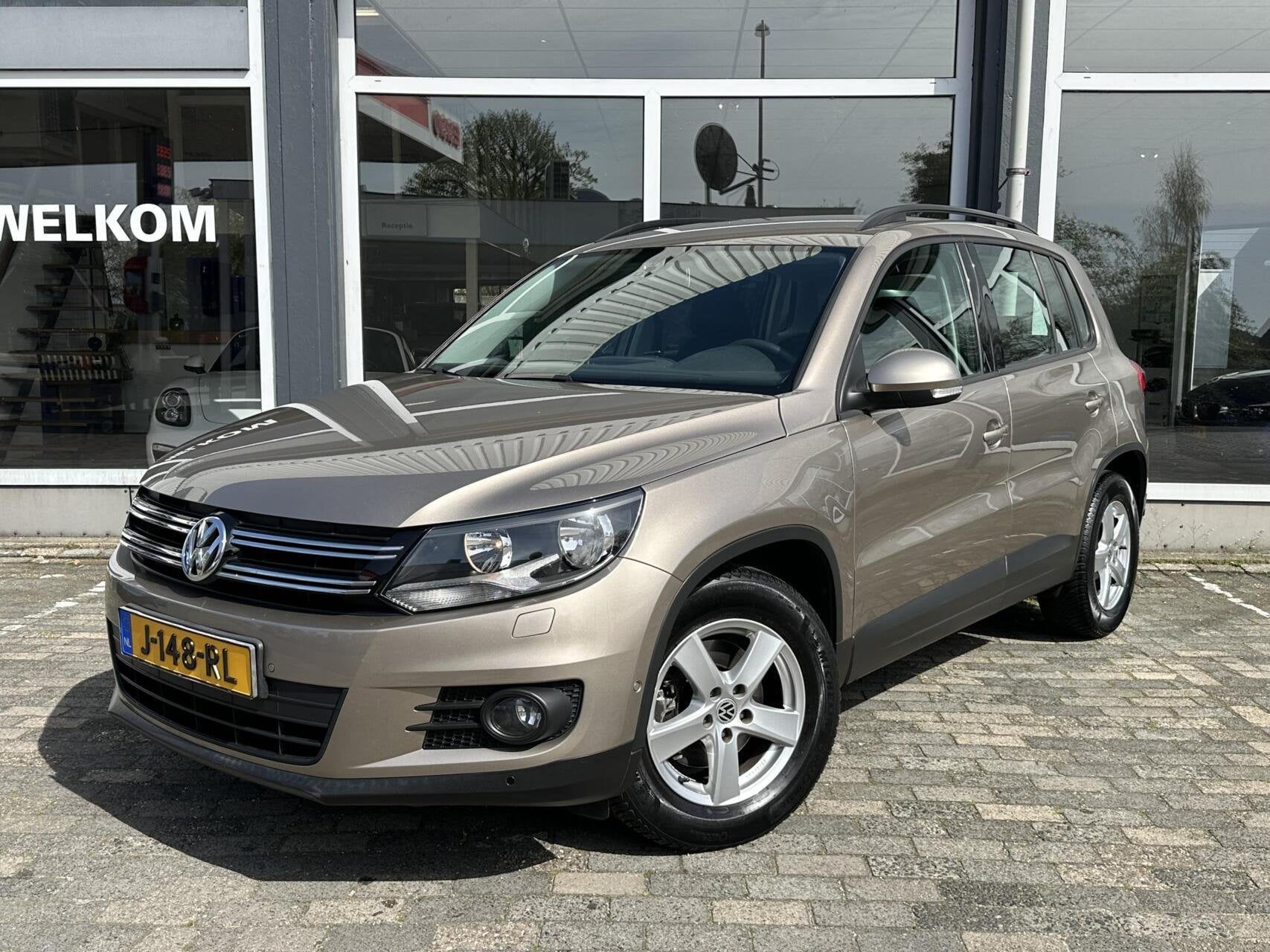 Volkswagen Tiguan 1.4 TSI Sport&Style|PDC|Trekhaak|Rijklaar, Auto's, Voorwielaandrijving, Dealer onderhouden, Gebruikt, Euro 6