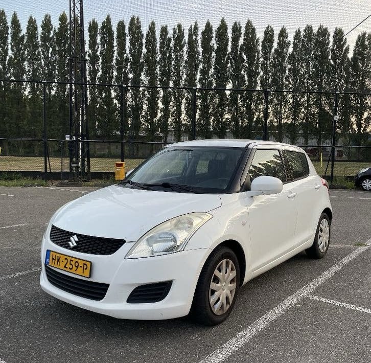 Suzuki Swift 1.2 5-D Comfort 2011 Wit, Auto's, Voorwielaandrijving, 4 cilinders, 400 kg, Handgeschakeld