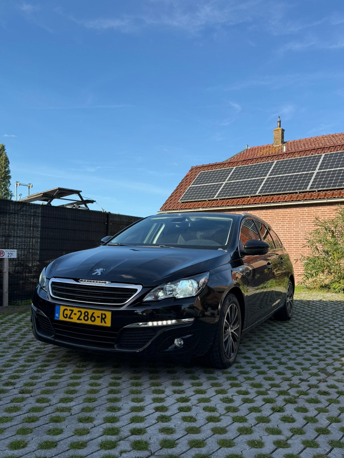 Foto 6 van Peugeot 308 1.2 E-thp 81KW/110PK SW 2015 Zwart