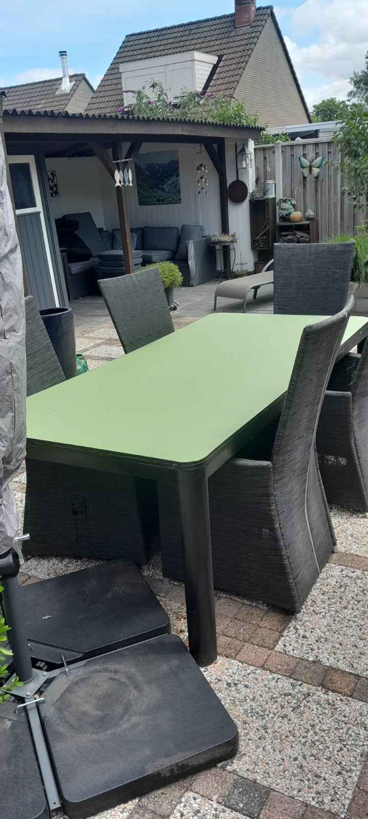 tuintafel met 6 stoelen en bij passende grijze stoelkussens, Ophalen, Kunststof, Gebruikt, 6 zitplaatsen