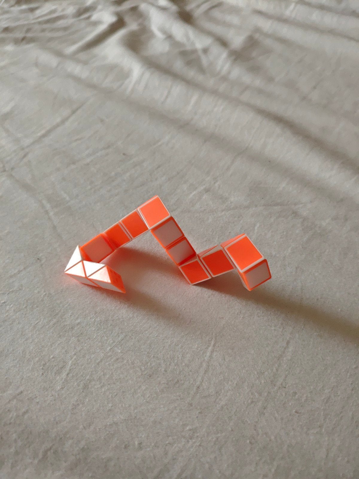 Rubik's Slang Puzzel - Oranje en Wit, Ophalen of Verzenden
