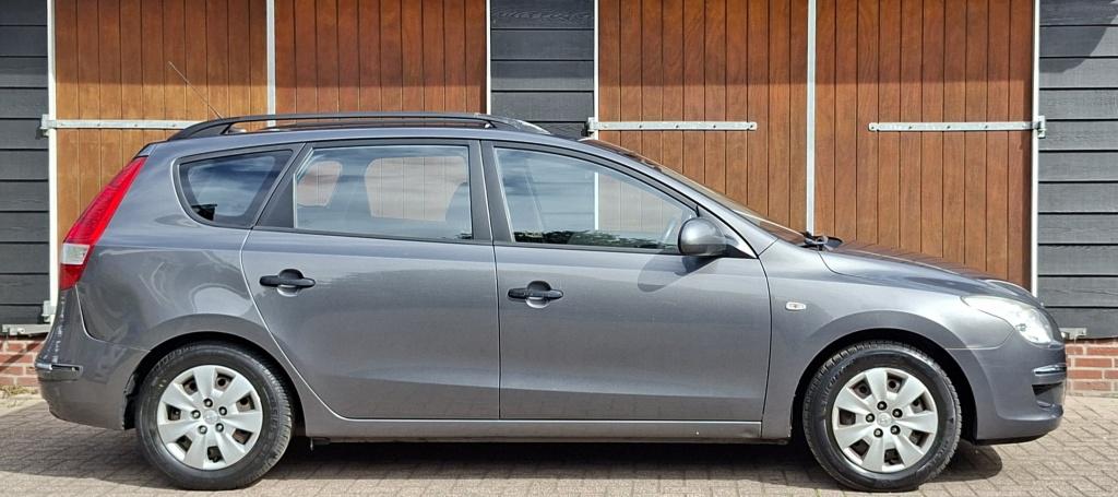 Hyundai I30 CW 1.6i Active Cool | Airco | Trekhaak | NAP | I, Auto's, 127 pk, Multifunctioneel stuurwiel, Gebruikt, 1591 cc