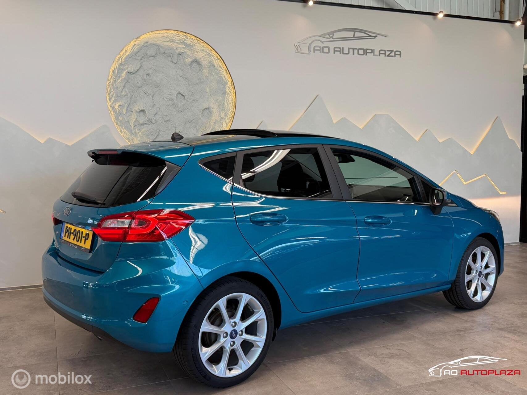 Ford Fiesta 1.0 EcoBoost Titanium Panorama/Keyless/Carplay/C, Voorwielaandrijving, 40 €/maand, Blauw, 23 km/l