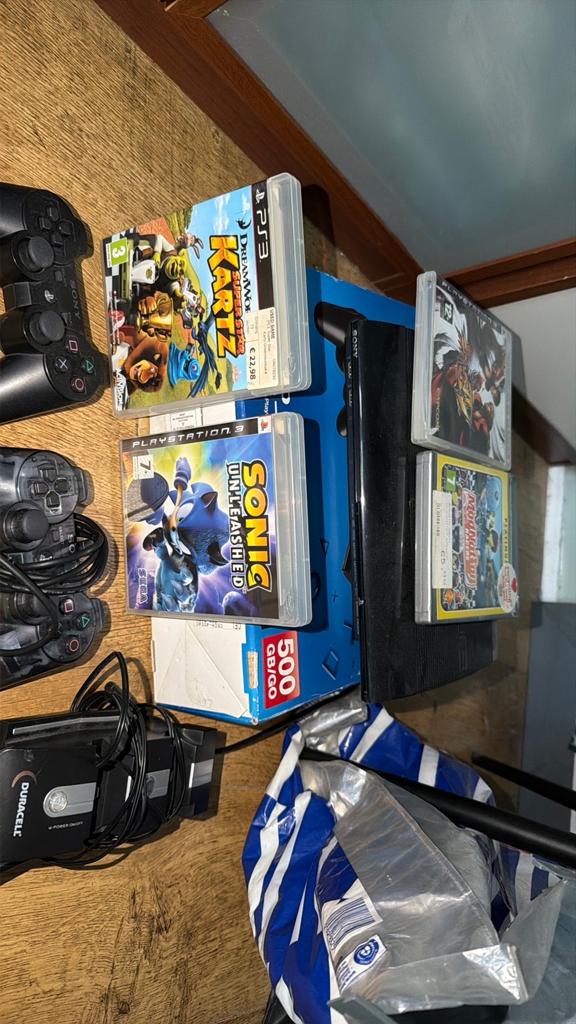 PlayStation 3 met 500GB, 2 controllers en 4 games, Gebruikt, Racen en Vliegen, 2 spelers, Ophalen of Verzenden