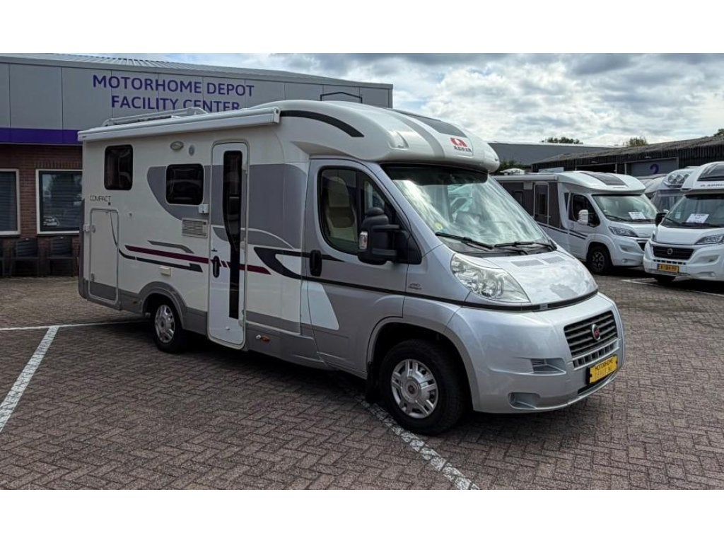 Adria Compact SL Lengtebedden Euro5 LPG zeer compleet!, Caravans en Kamperen, Campers, Luifel, Ringverwarming, Fiat, Tot en met 2