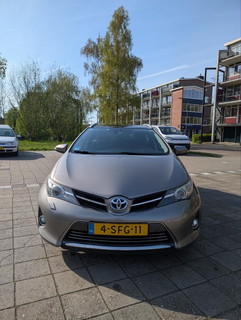 Toyota Auris Hybrid Lease Pro VOL OPTIES Pano JBL Keyless, Auto's, Euro 5, Zwart, Bruin, Leder en Stof
