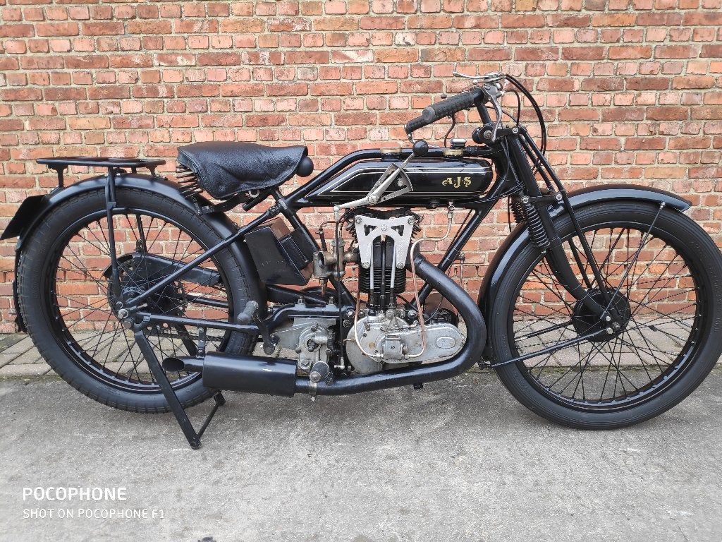 AJS