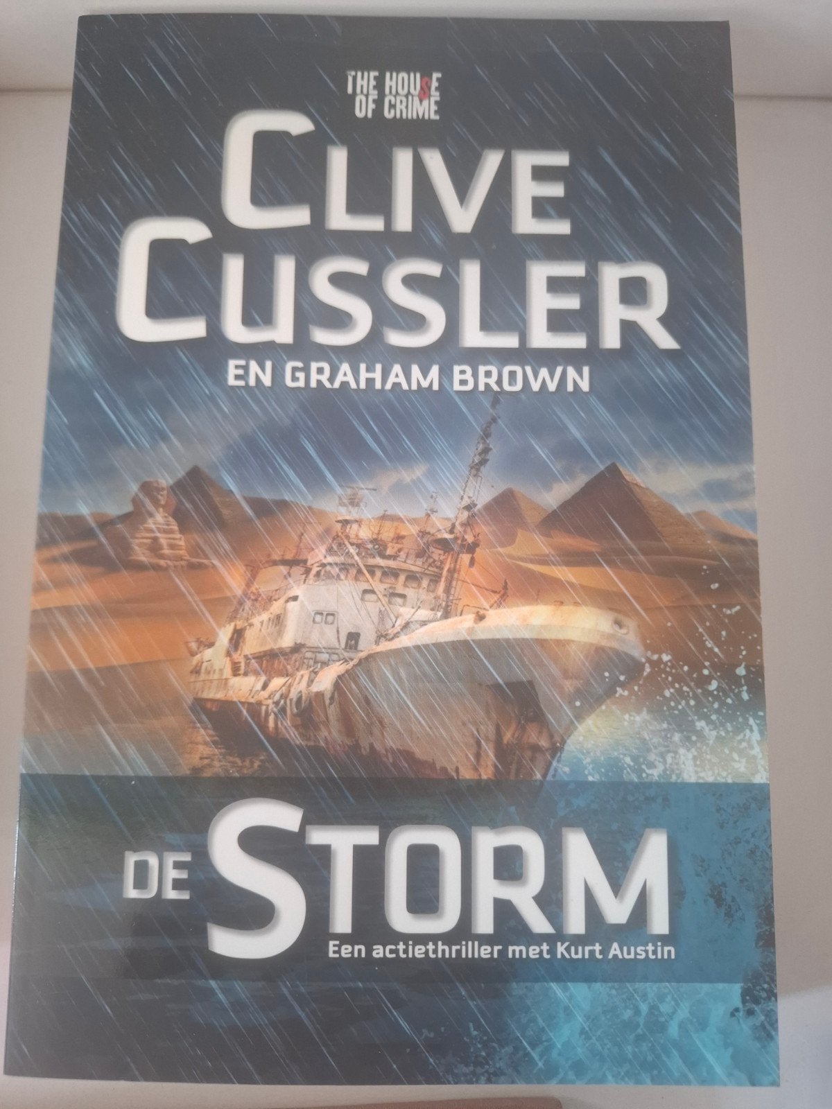 Clive Cussler & Graham Brown - De Storm, Ophalen of Verzenden, Zo goed als nieuw, Clive Cussler en Graham Brown, Nederland