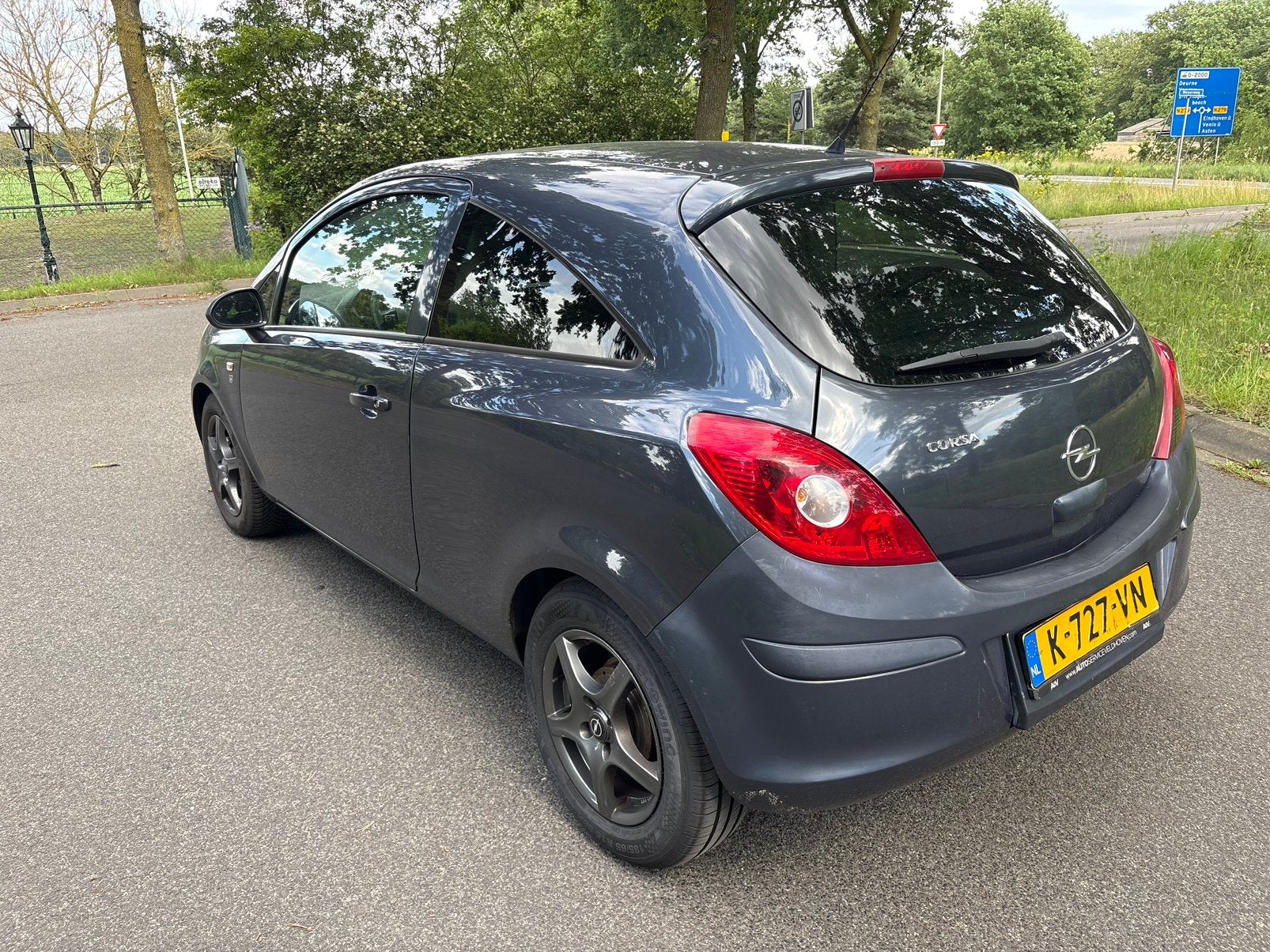 Foto 5 van Opel Corsa 1.2 Ecoflex 51KW 3D 2010 Grijs