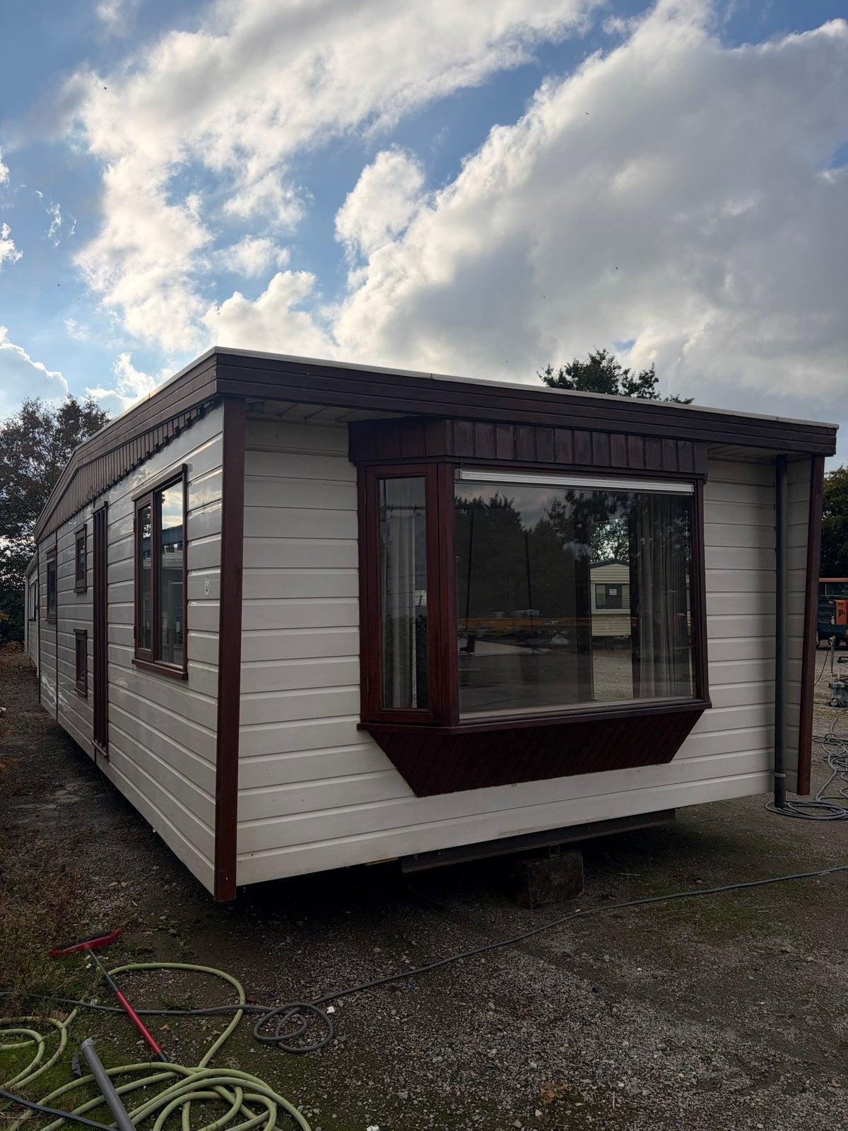 Kunststof chalet winterhard DG 10x4m inclusief transport, Caravans en Kamperen, Tot en met 4