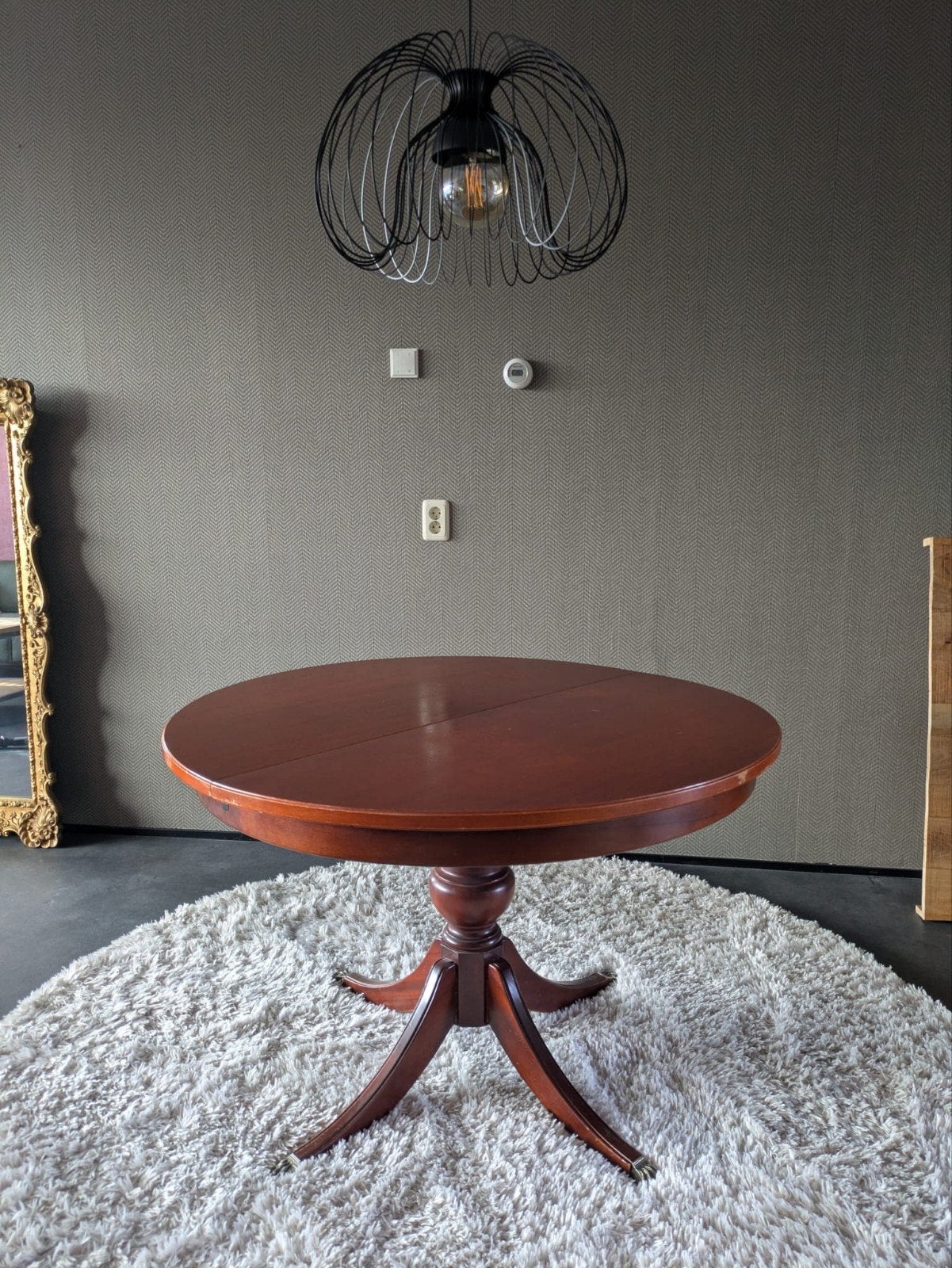 Uitschuifbare ronde eettafel van hout