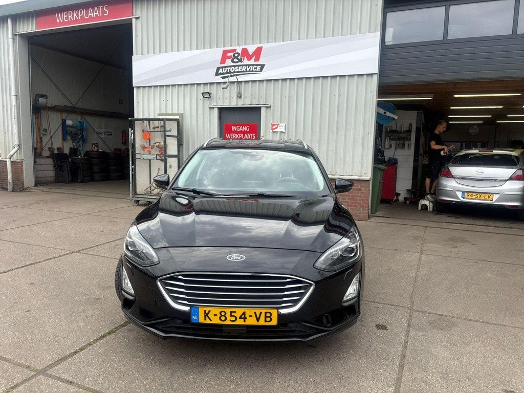 Ford Focus Wagon 1.0 EcoBoost Titanium Business Stoel-Stuurv, Auto's, Ford, Gebruikt, Euro 6, 715 kg, Zwart