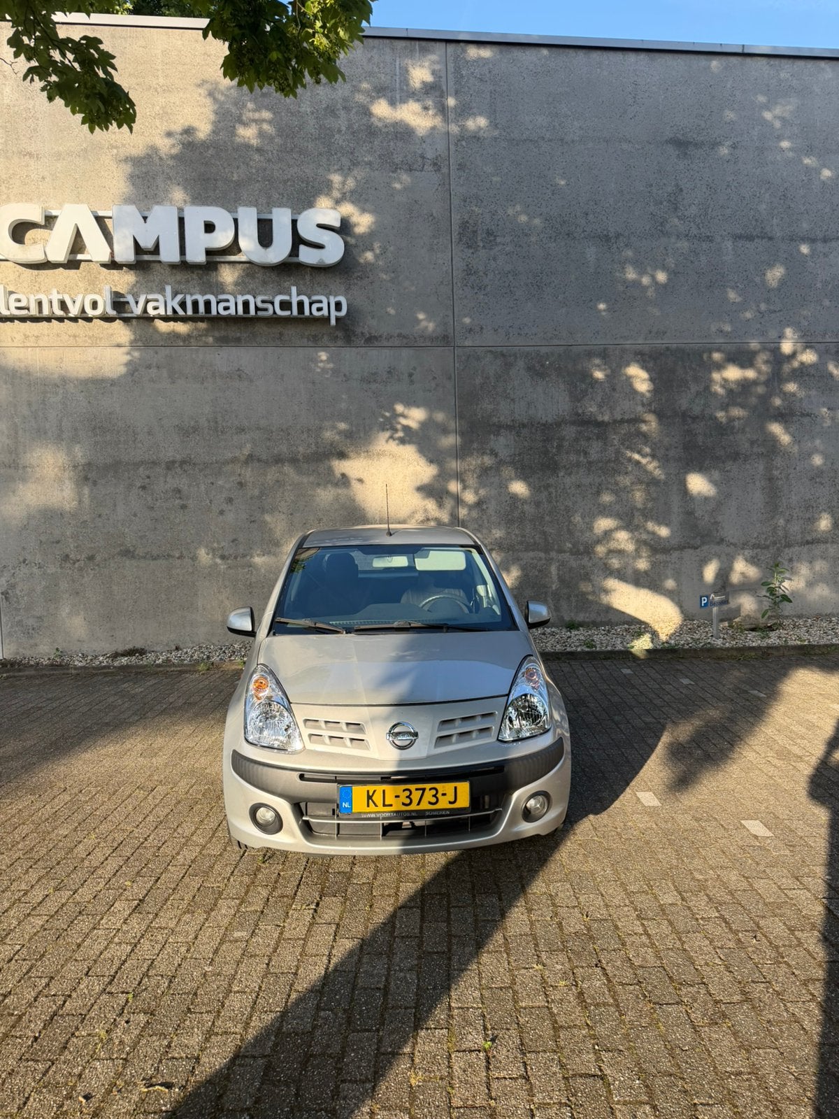 Nissan Pixo 1.0 50KW 5D 2013 Grijs airco, Voorwielaandrijving, Stof, 4 stoelen, Handgeschakeld