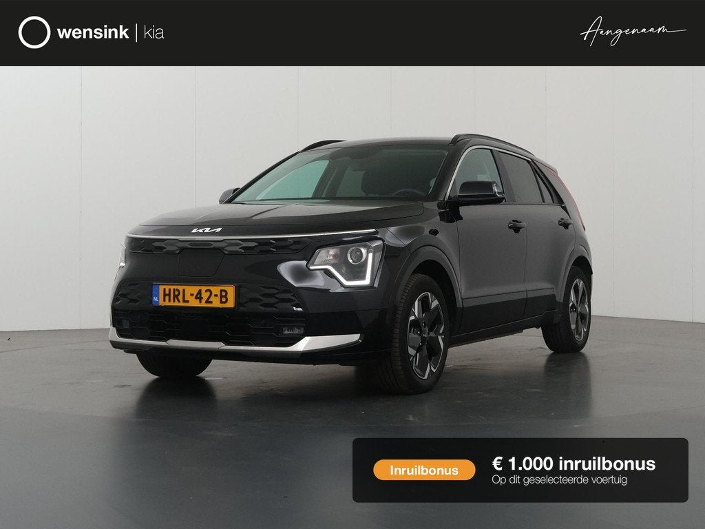 Kia Niro EV Light Advanced 64.8 kWh | Stoel verwarming | App, Auto's, Kia, Gebruikt, 750 kg, 1657 kg, Leder en Stof