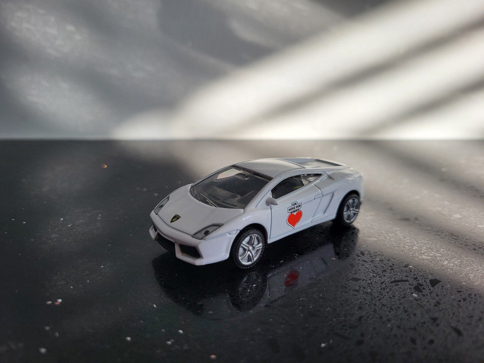 Lamborghini Gallardo LP560-4 Ein Herz für Kinder 1/55 Siku, Ophalen of Verzenden, Zo goed als nieuw, Auto