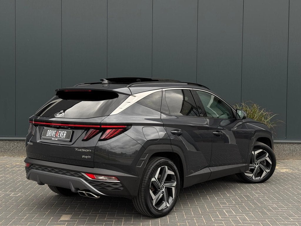 Hyundai TUCSON 1.6 T-GDI PHEV Premium 4WD FULL PANO | LEDER, Auto's, Automaat, 1350 kg, Gebruikt, 4 cilinders