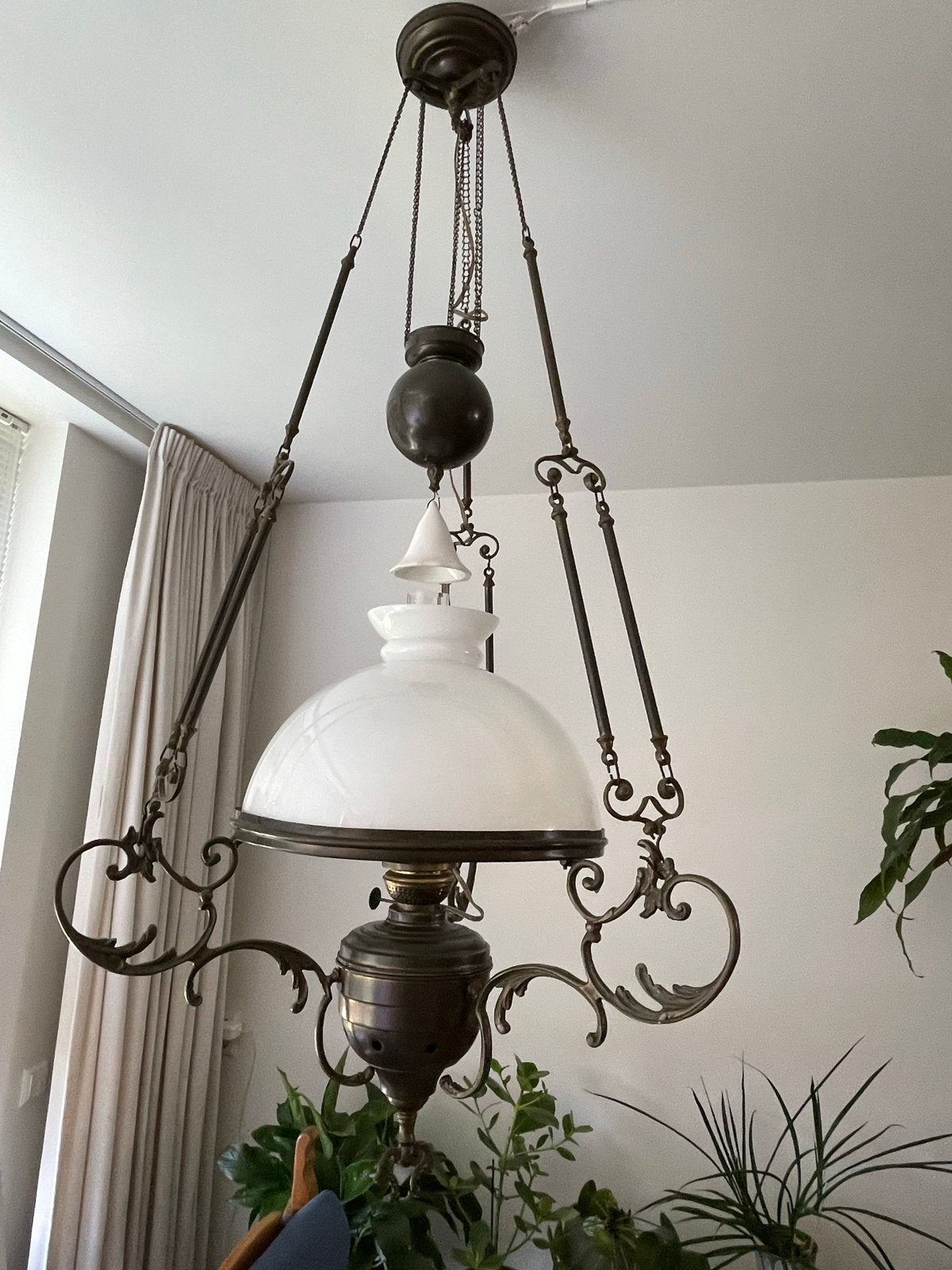 Antieke olielamp, omgebouwd tot hanglamp, Ophalen
