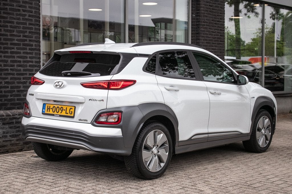 Hyundai KONA EV Premium 64 kWh | Fase 3 | Stoelventilatie |, Auto's, Hyundai, 12 maanden, Gebruikt, Zwart, Automatische klimaatregeling