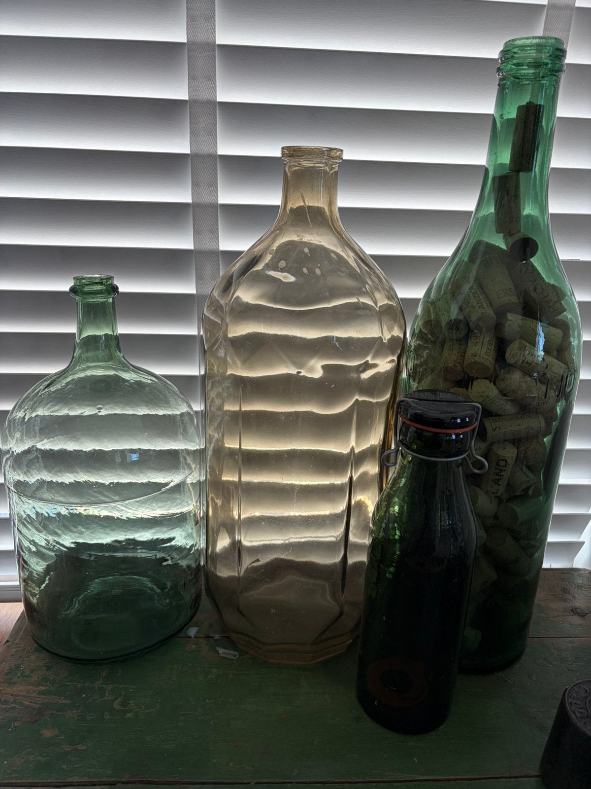 Set van 4 decoratieve flessen van getint glas, Antiek en Kunst, Ophalen of Verzenden