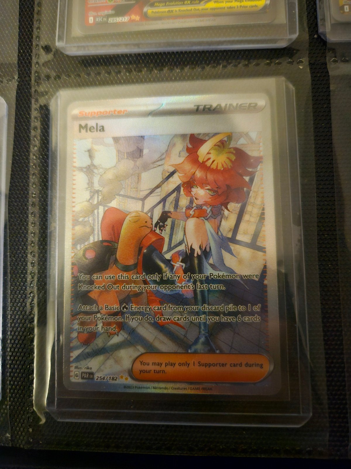 Pokemon Mela 254/182 Paradox Rift, Ophalen of Verzenden, Zo goed als nieuw, Losse kaart, Foil