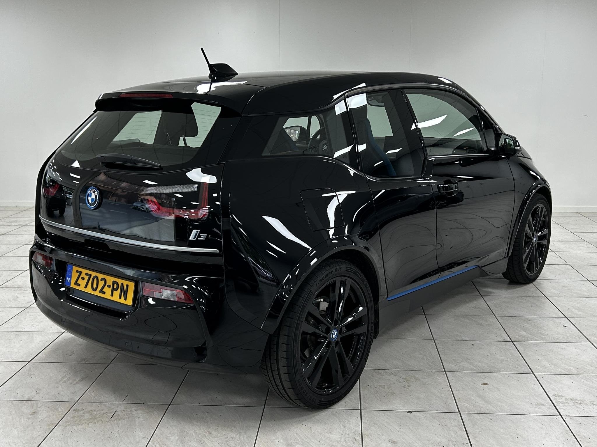 BMW i3 Business Edition 120Ah 42 kWh NAVIGATIE | PARKEERSENS, Auto's, Huisgarantie, Met garantie (alle), 4 stoelen, 258 min