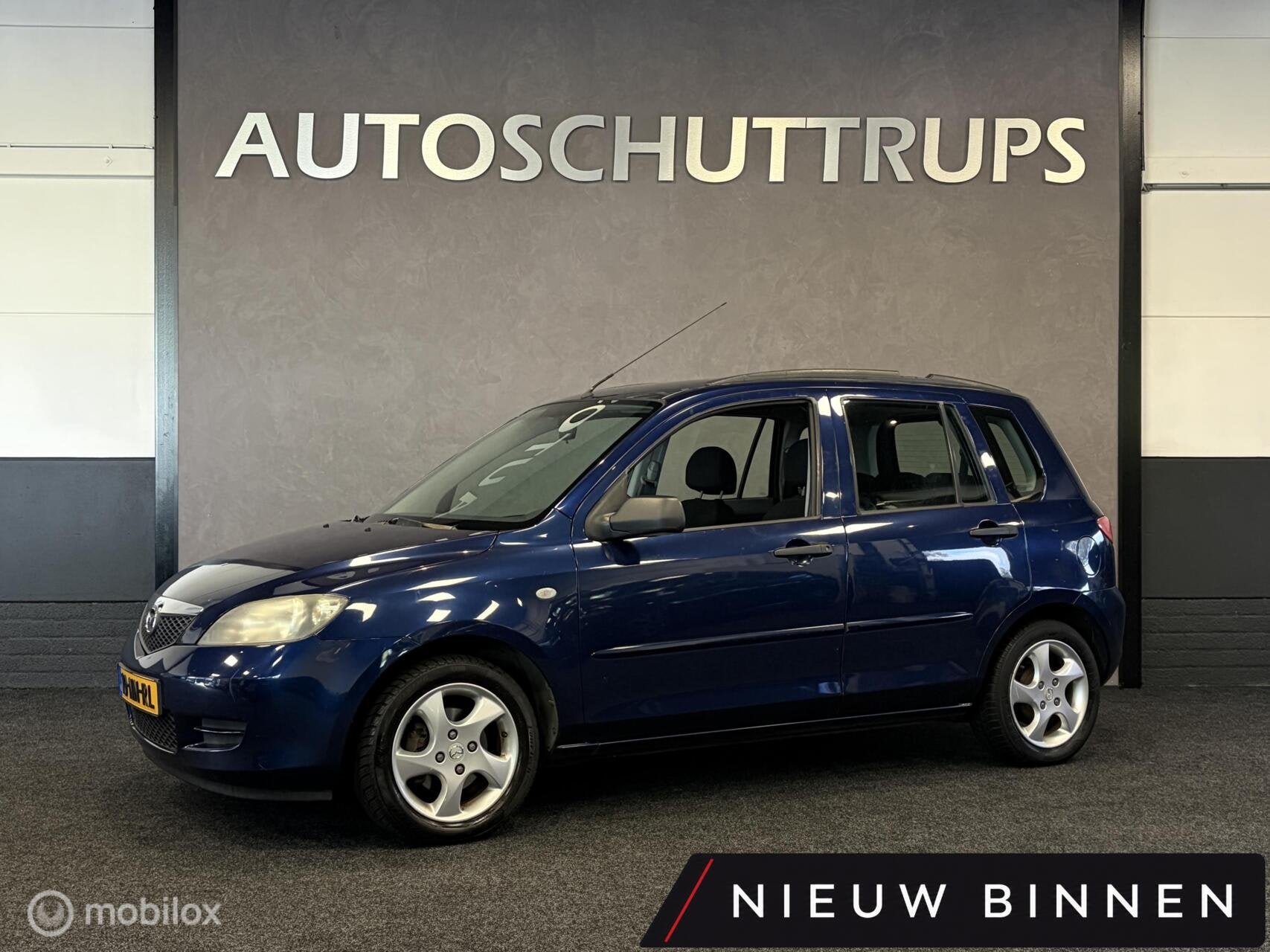 Mazda 2 1.4 Exclusive AUTOMAAT / INRUILKOOPJE / TR.HAAK /, Zwart, 4 cilinders, Blauw, Origineel Nederlands
