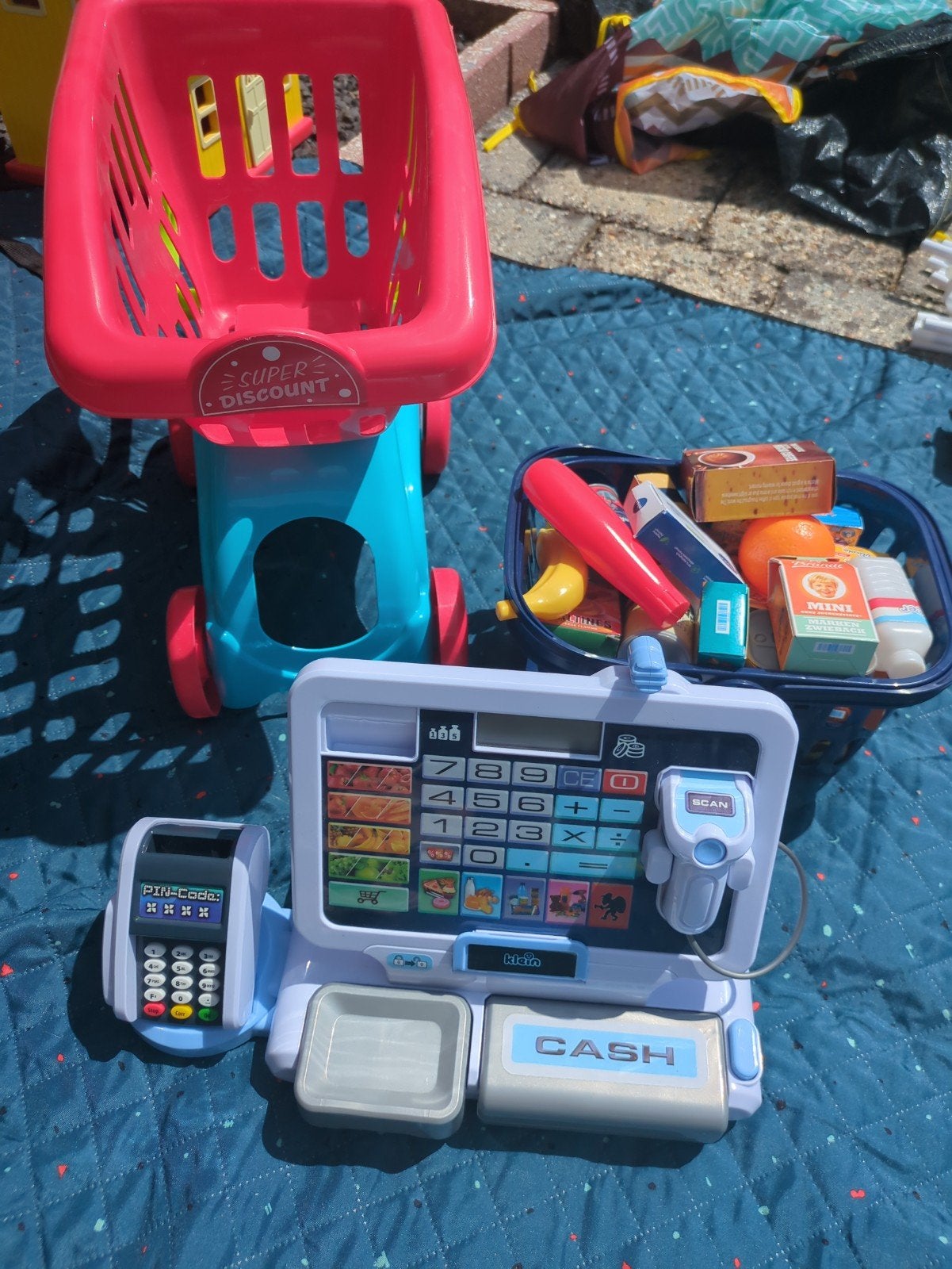VTech kassa met winkelwagen en boodschappen, Ophalen