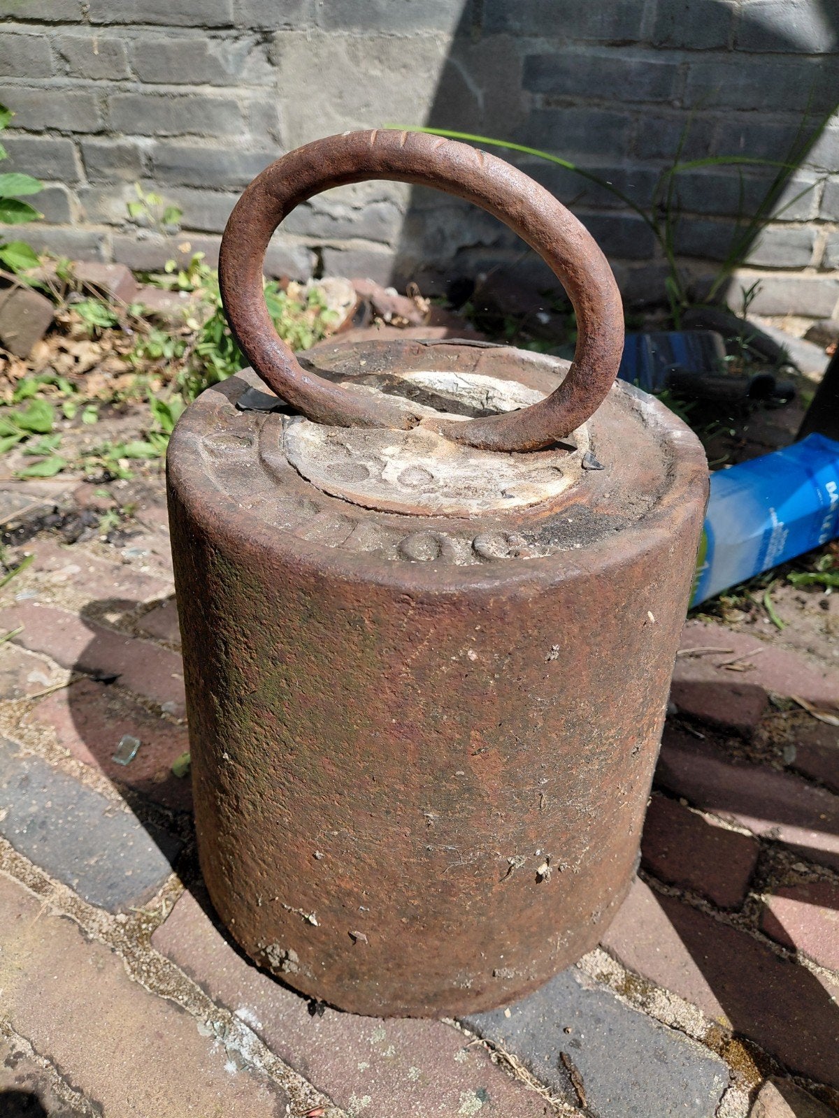 Oude gietijzeren gewichten, Ophalen