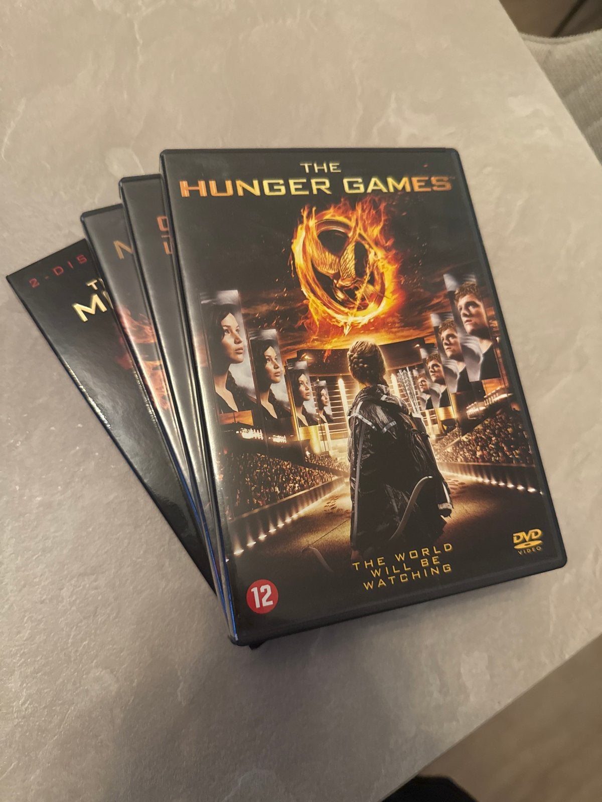The Hunger Games 1, 2 & 3 (deel 1 & 2) DVD-bundel, Cd's en Dvd's, Nederlands, Ophalen of Verzenden, Vanaf 12 jaar, Inclusief doosje