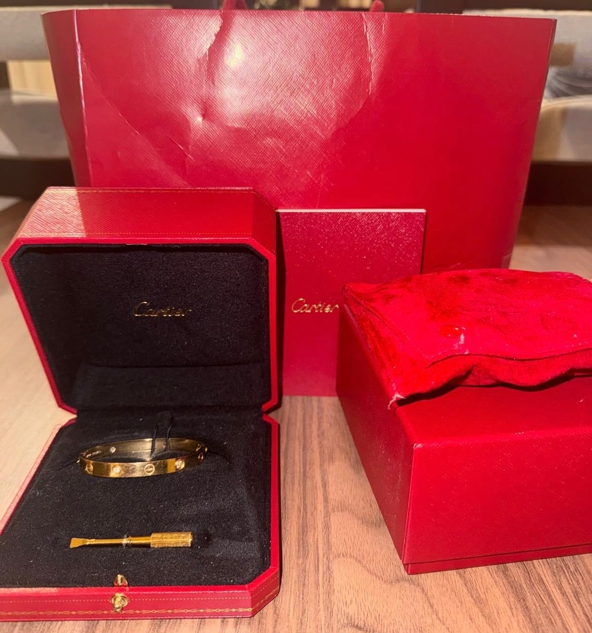 Cartier Love-armband 18K geelgoud met 4 diamanten, Ophalen of Verzenden, Zo goed als nieuw, Goud, Met edelsteen