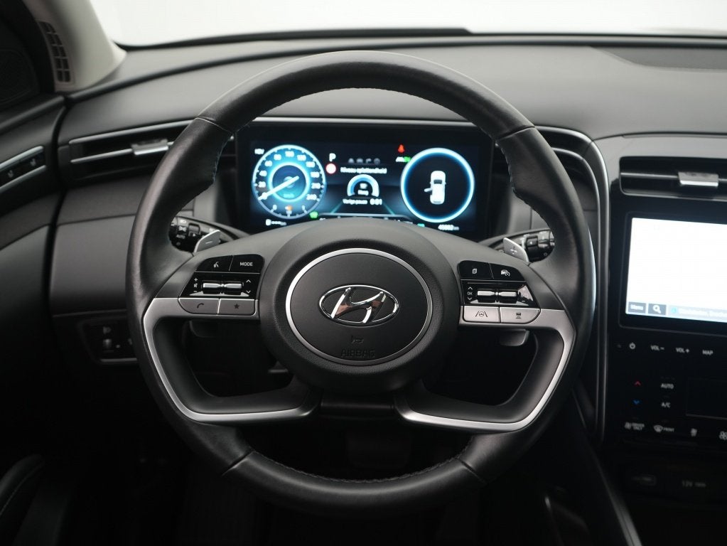 Hyundai Tucson 1.6 T-GDI PHEV 4WD 6AT 265PK Premium Sky | Pa, Auto's, 14 kWh, Gebruikt, 4 cilinders, Bedrijf