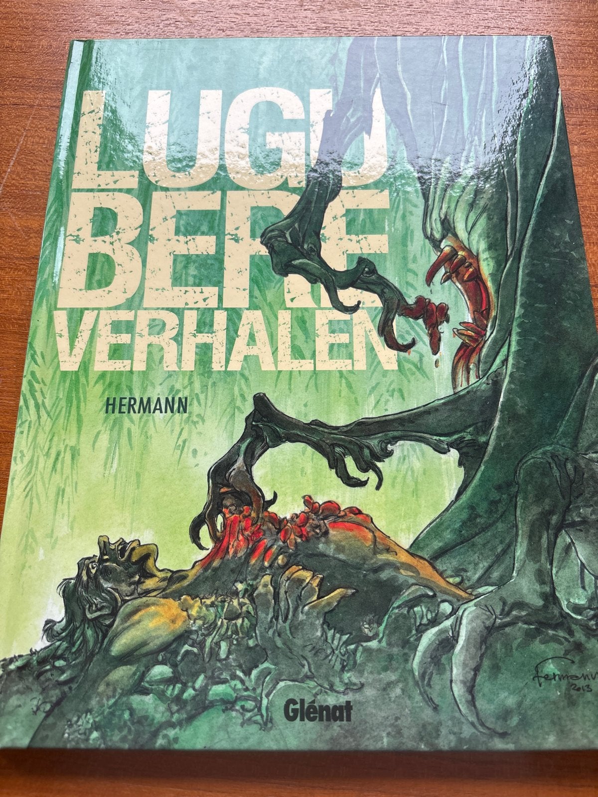 Lugubere Verhalen - Hermann (Hardcover) - Glénat, Boeken, Eén stripboek, Ophalen of Verzenden, Zo goed als nieuw