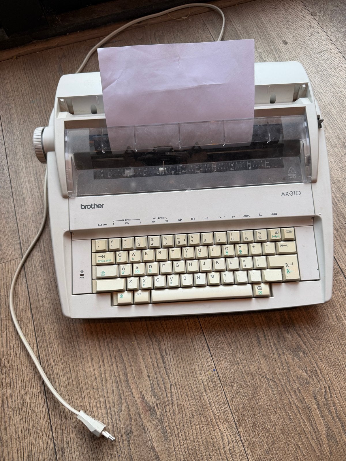 Brother elektronische schrijfmachine AX-310, Ophalen