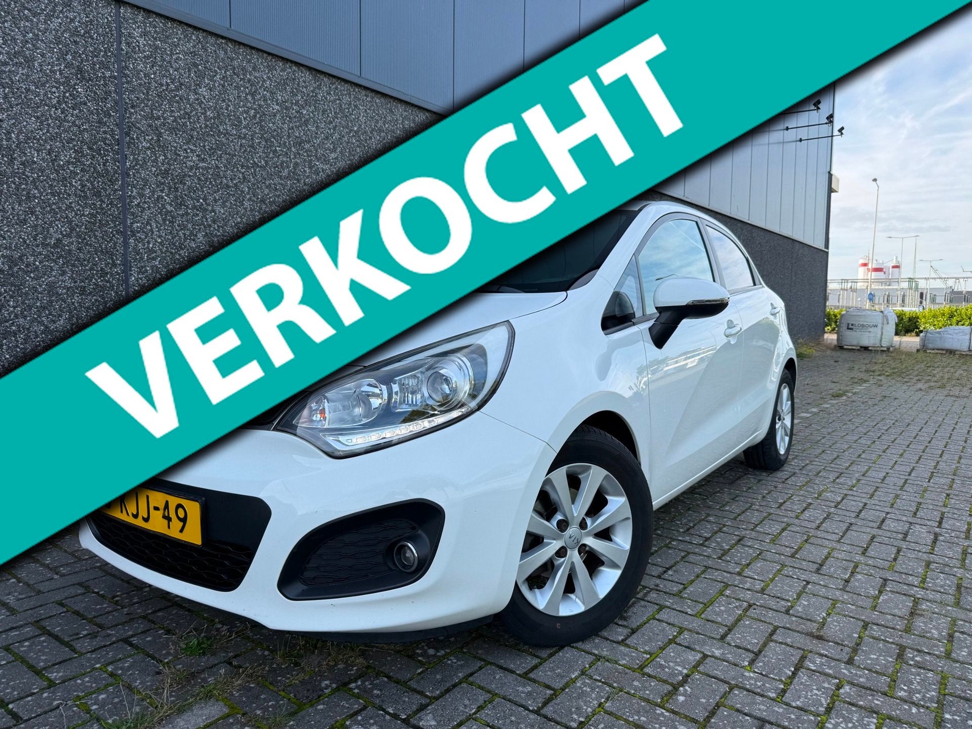 Kia Rio 1.2 CVVT Super Pack/Cruise/Clima/PDC/, Euro 5, Zwart, 4 cilinders, Wit