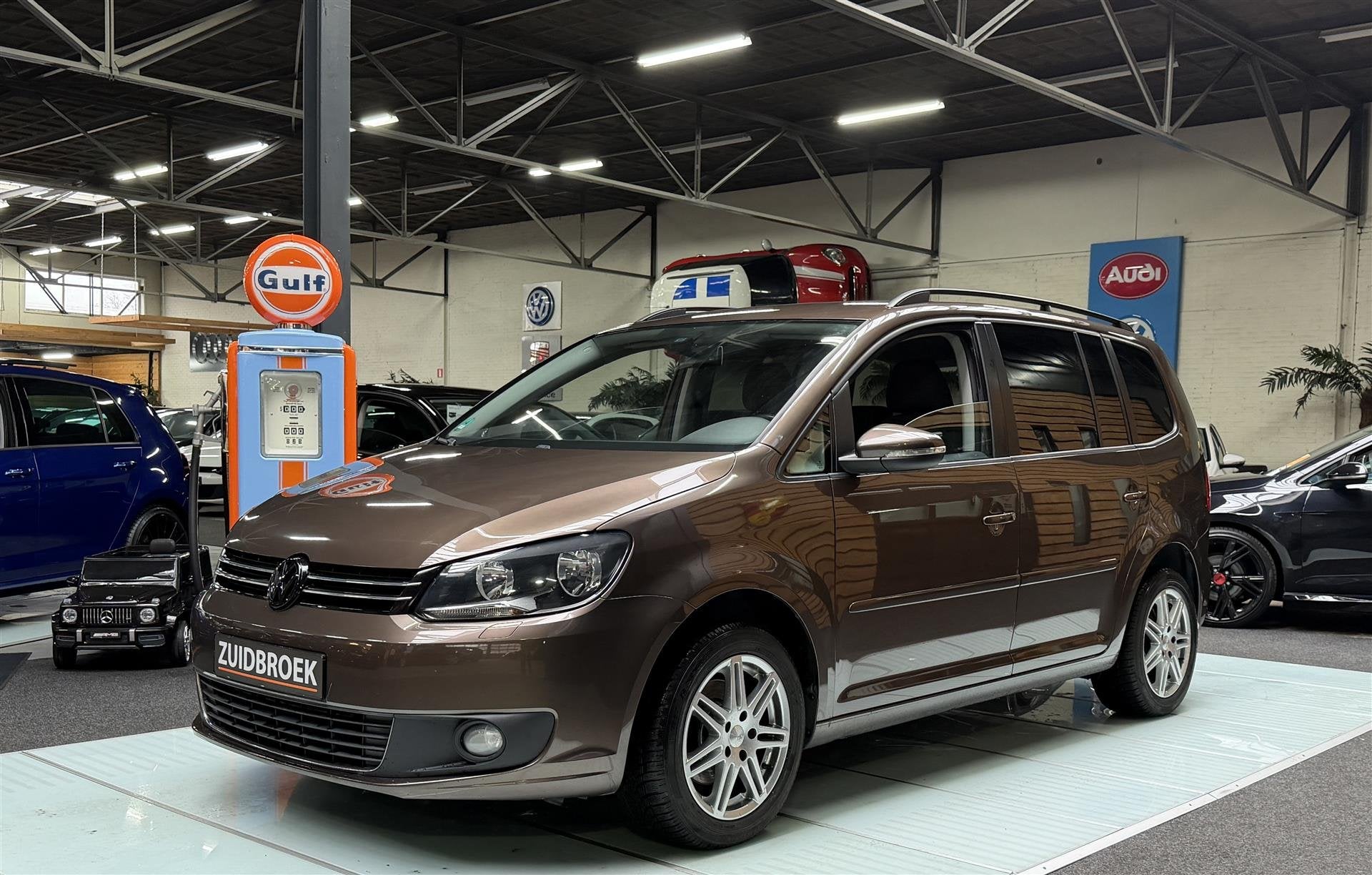 Volkswagen Touran 1.2 TSI 7-PERSOONS! Cruise! Clima! Navi!, Auto's, Gebruikt, 4 cilinders, Bruin, Bedrijf
