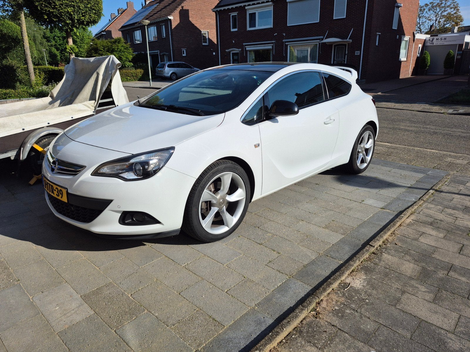 Opel Astra 1.4 16V 103KW GTC 2014 Wit, Auto diversen, Wieldoppen, Ophalen of Verzenden, Zo goed als nieuw
