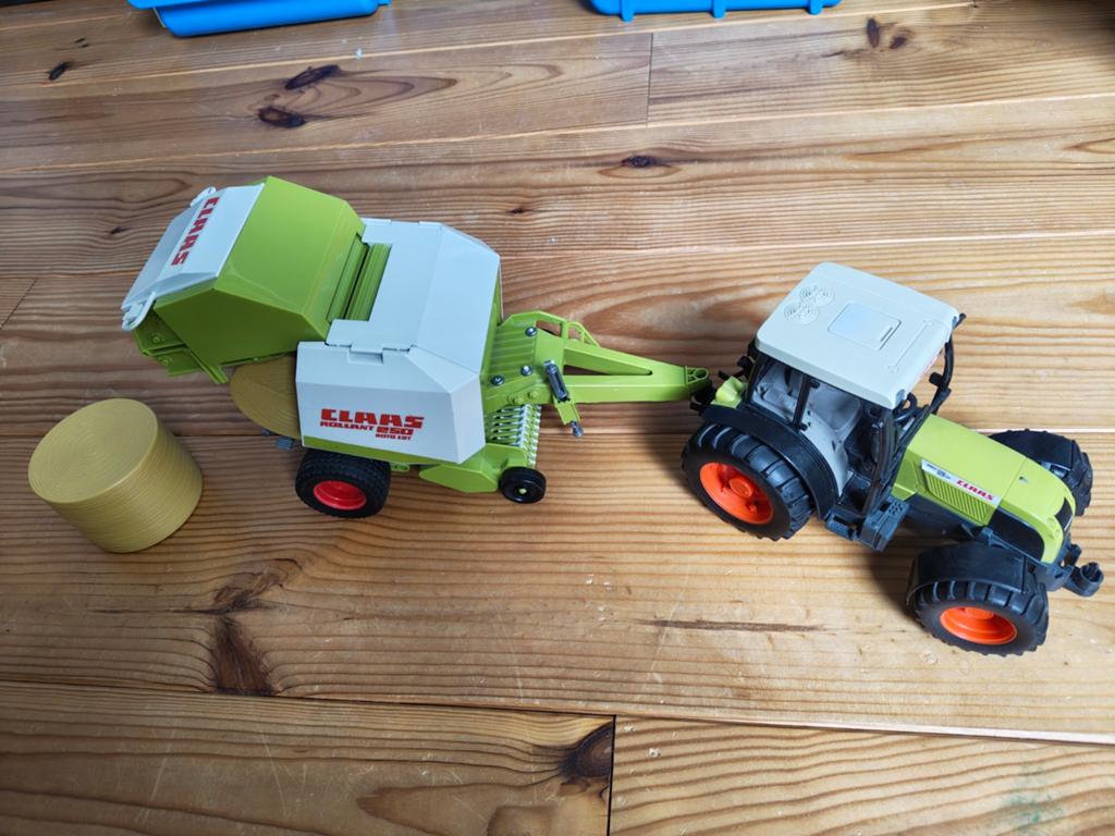 Bruder Claas tractor met balenpers en baal, Ophalen of Verzenden, Gebruikt