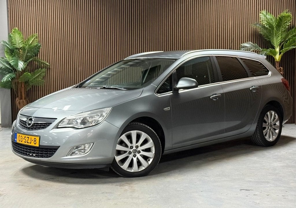 Opel Astra Sports Tourer 1.4 Turbo Cosmo (bj 2011), Auto's, Voorwielaandrijving, Gebruikt, 4 cilinders, 1337 kg