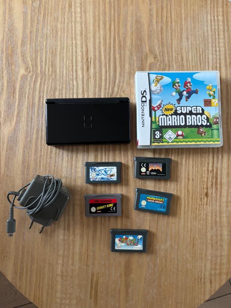 Nintendo DS lite inclusief 6 spellen, Spelcomputers en Games, Spelcomputers | Nintendo DS, Ophalen of Verzenden, Gebruikt, Zwart